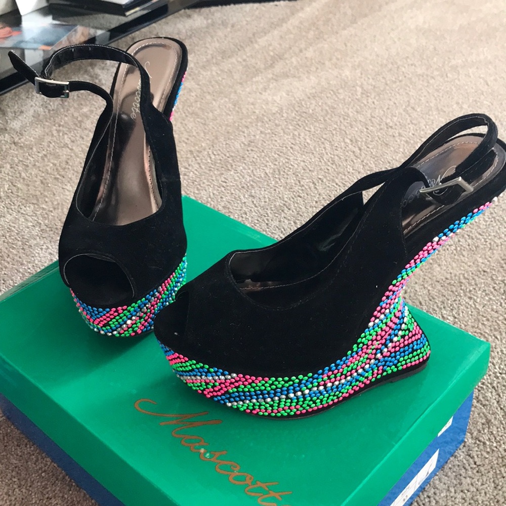 Open toe wedges.